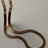 Collier aplati