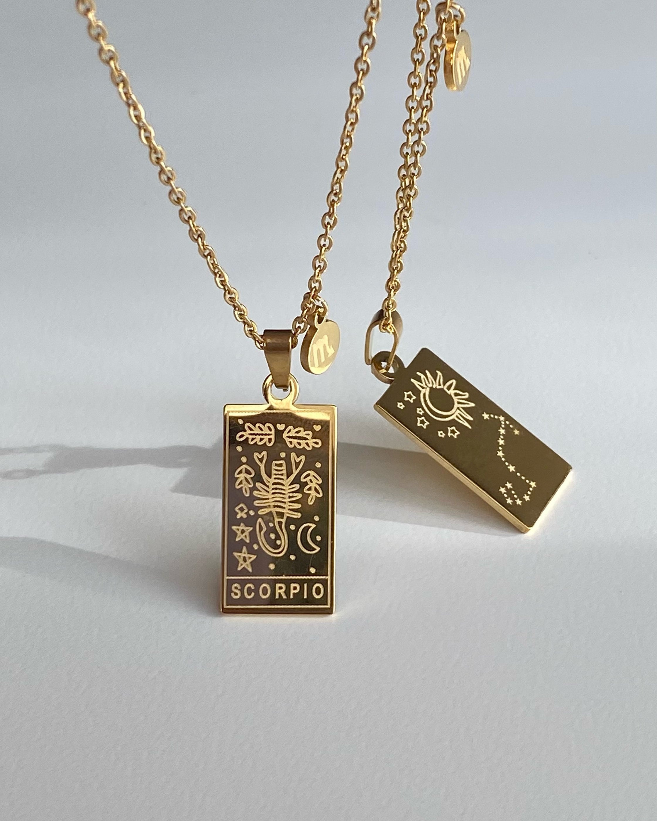 Collar con doble medalla del zodíaco