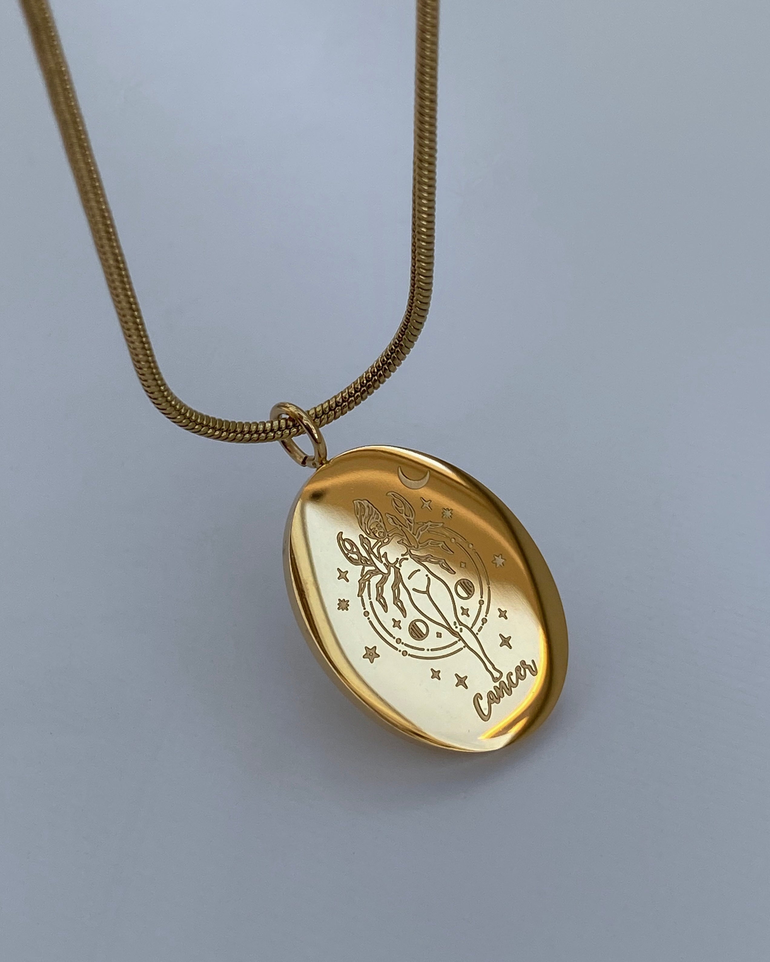 Collar con medalla del zodiaco ovalada