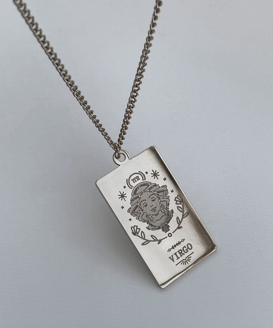 Collana con medaglia dello zodiaco