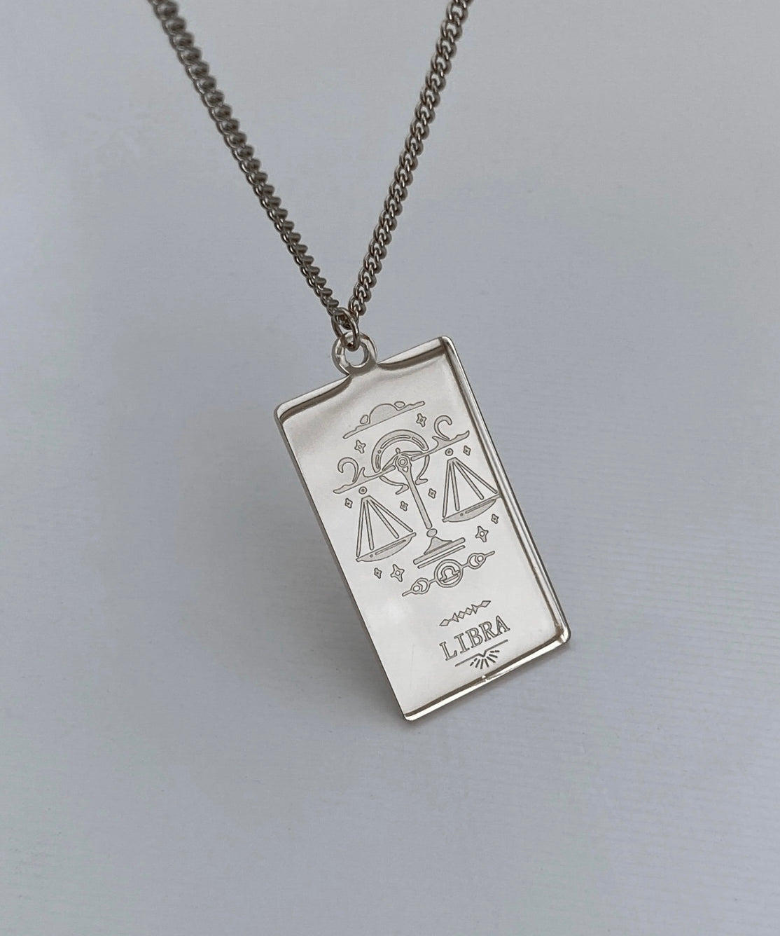 Collana con medaglia dello zodiaco