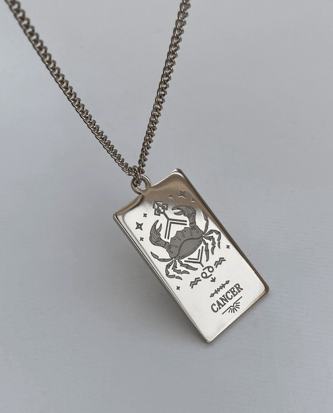 Collar con medalla del zodiaco
