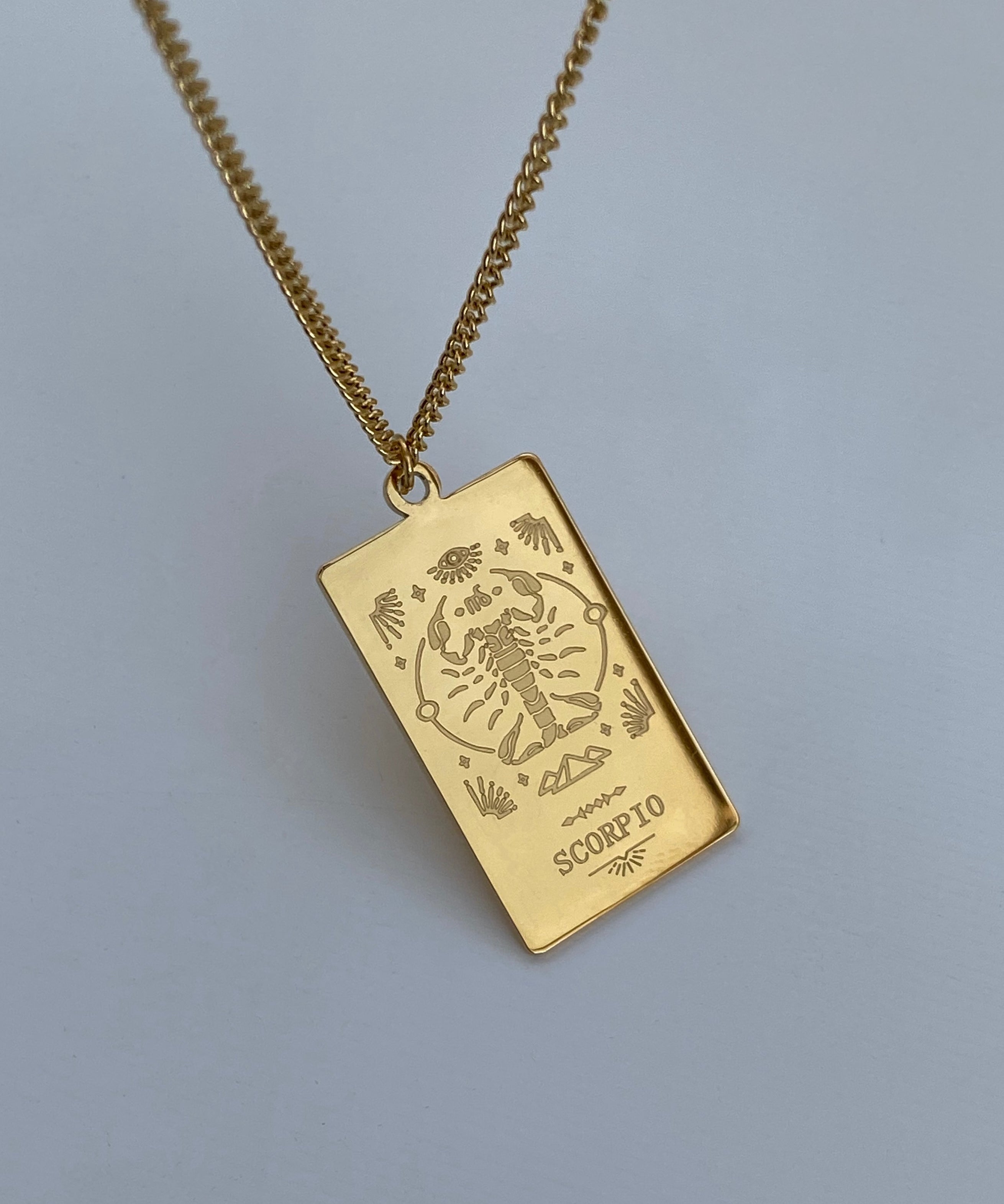Collana con medaglia dello zodiaco