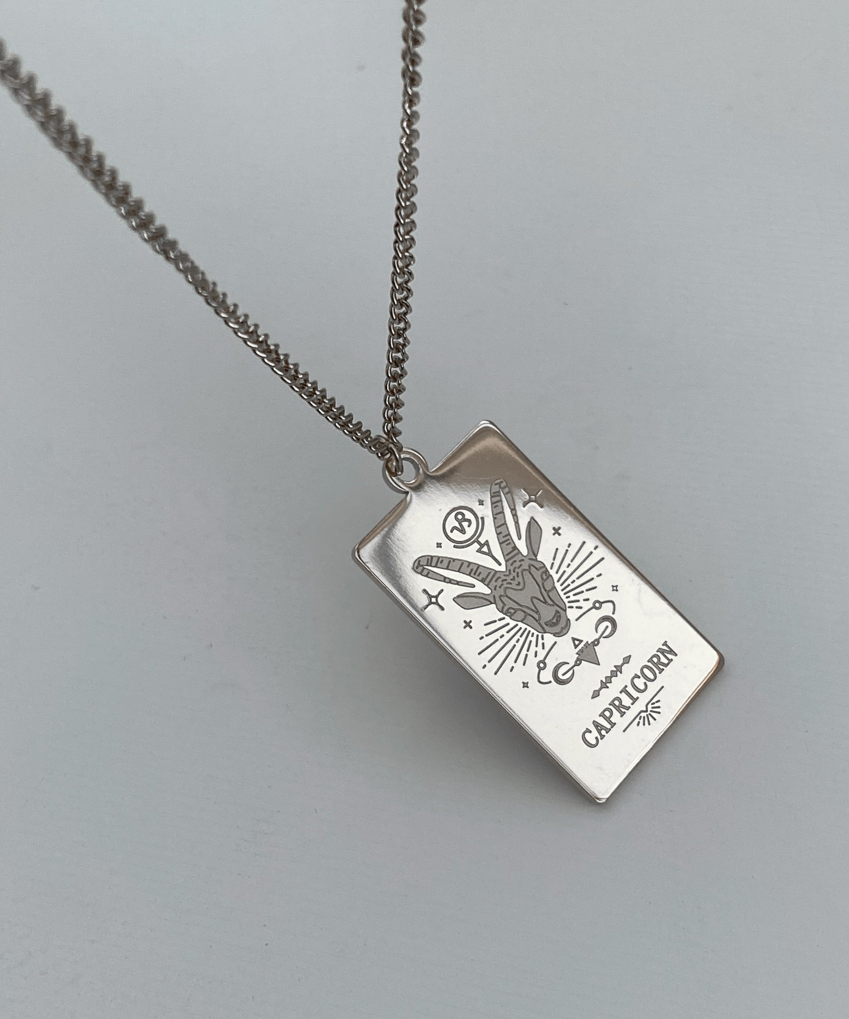 Collana con medaglia dello zodiaco