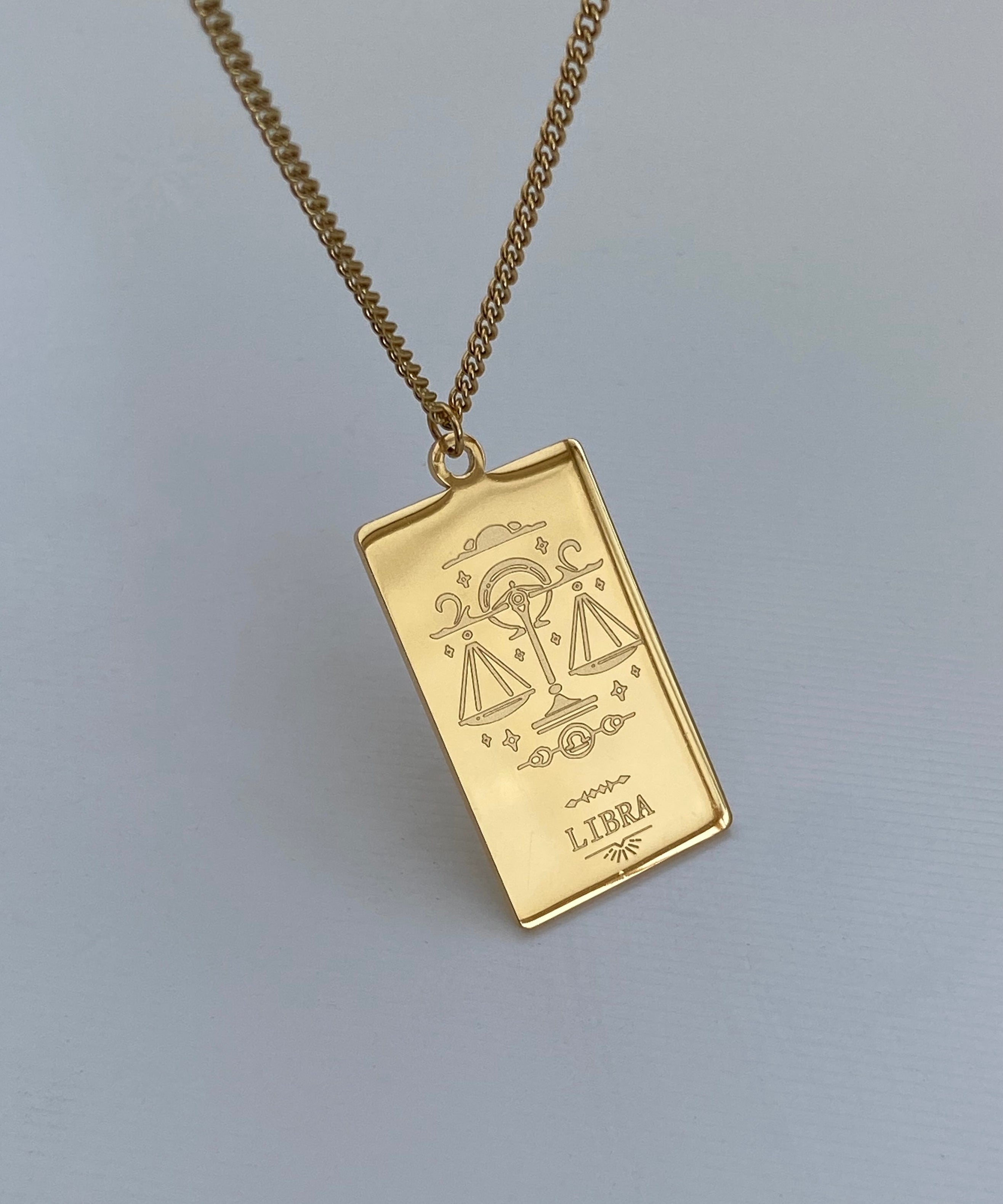 Collana con medaglia dello zodiaco