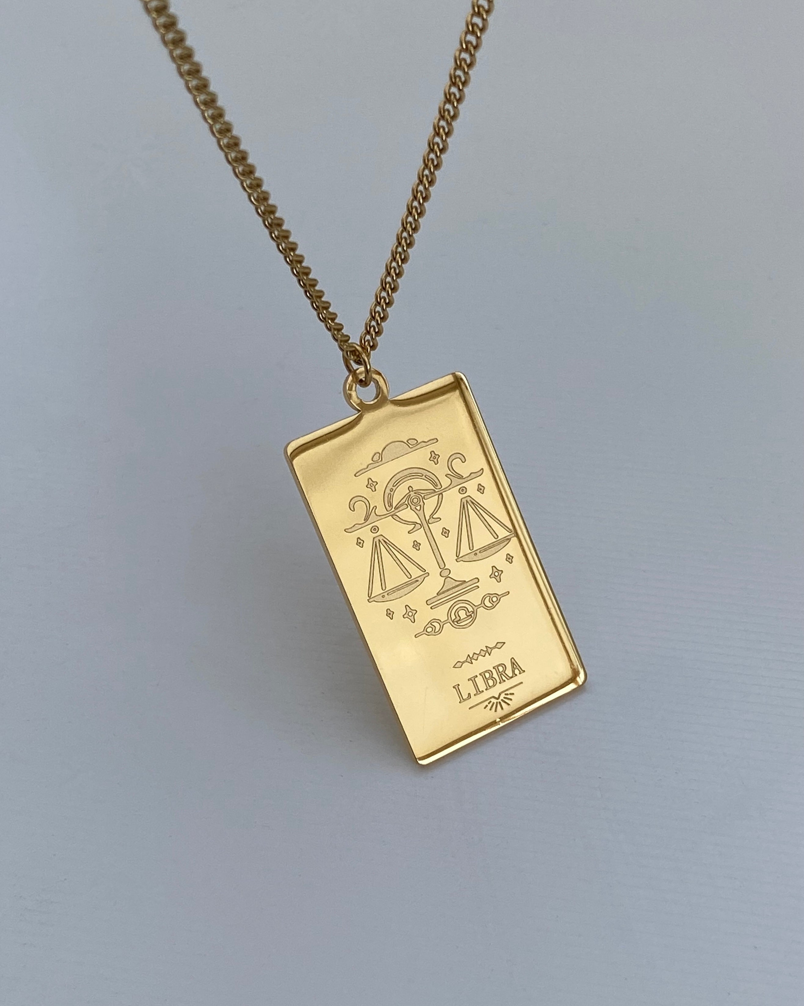 Collar con medalla del zodiaco