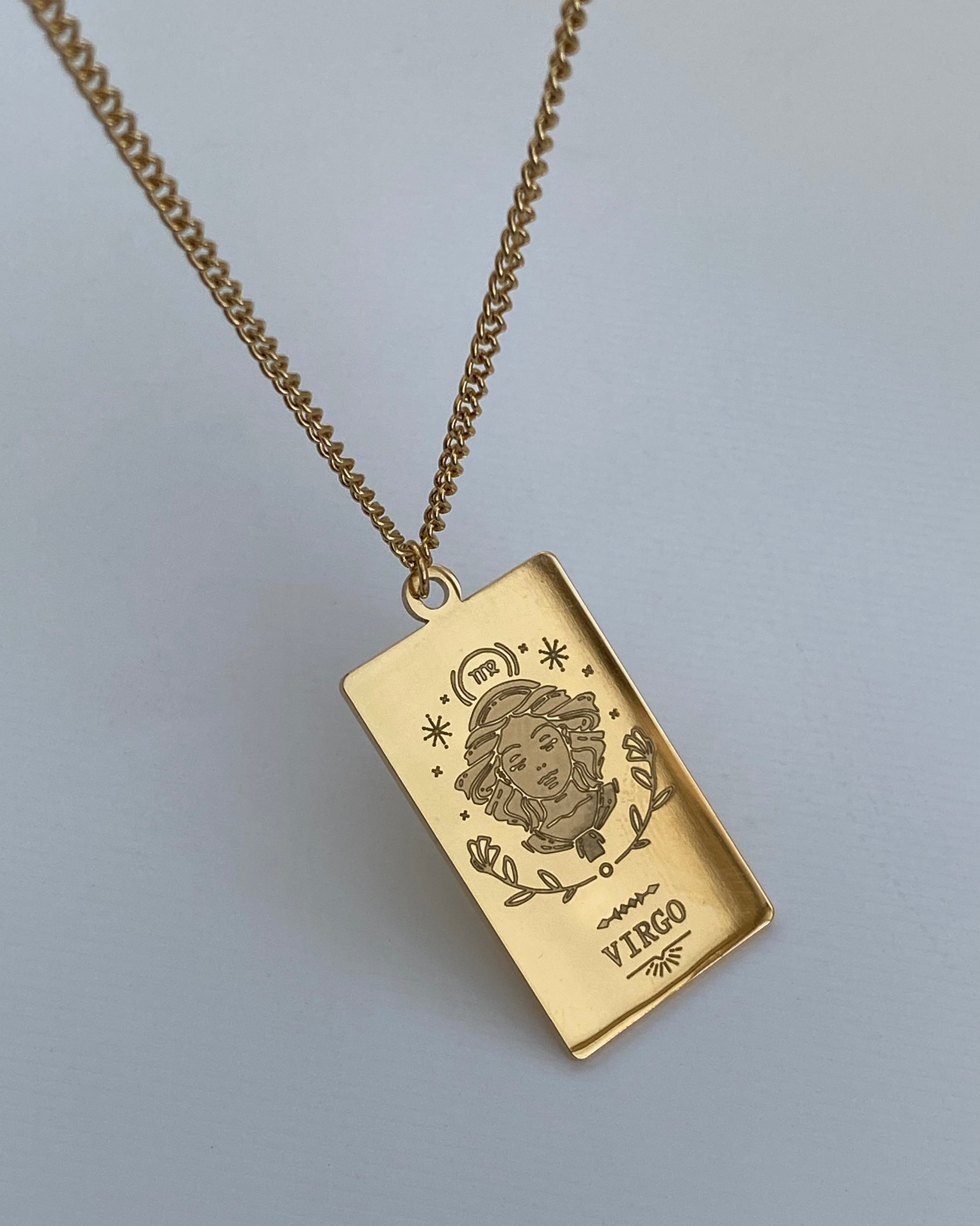 Collar con medalla del zodiaco